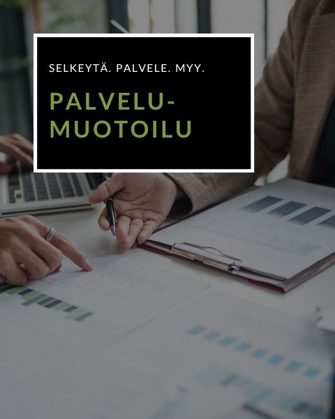 työpöydän äärellä kaksi ihmistä keskustelemassa, vain kädet näkyvät